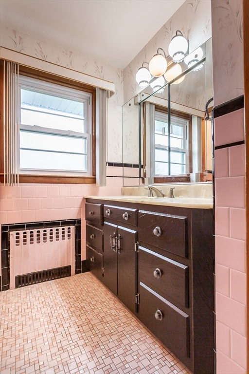 141 Kaufman Road Somerset, MA 02726 - Photo 21 of 26 a kitchen with a stove a sink and a window