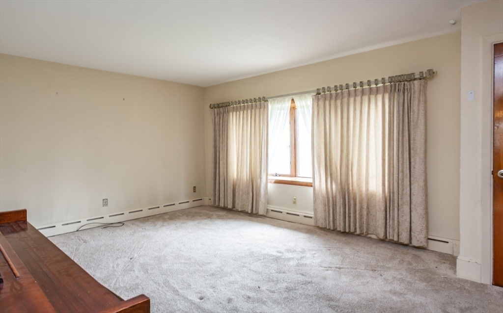 141 Kaufman Road Somerset, MA 02726 - Photo 7 of 26 an empty room with windows