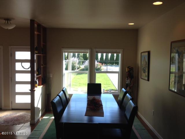 5305 Lombard Loop Road Zillah, WA 98953 - Photo 16 of 27 a view of a dining room with furniture and a window