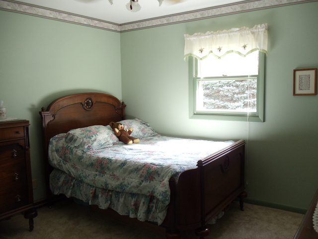 149 Swanson Road Sycamore, IL 60178 - Photo 12 of 22 a bedroom with a bed and window