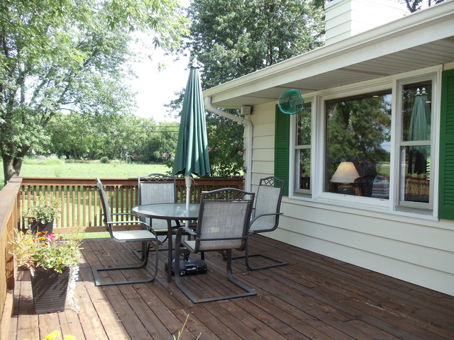 149 Swanson Road Sycamore, IL 60178 - Photo 16 of 22 a view of a patio on the deck