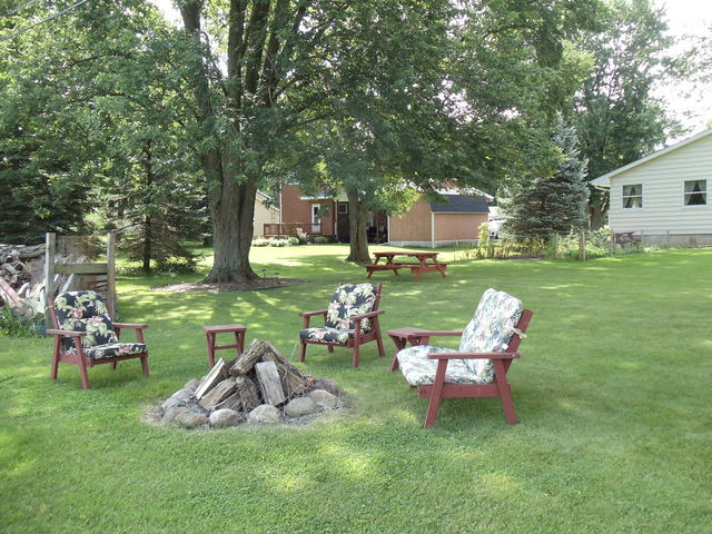 149 Swanson Road Sycamore, IL 60178 - Photo 20 of 22 a view of a table and chairs in the garden