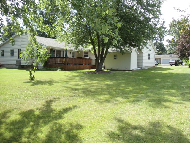 149 Swanson Road Sycamore, IL 60178 - Photo 22 of 22 a view of a house with a yard and tree s