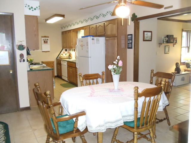 149 Swanson Road Sycamore, IL 60178 - Photo 6 of 22 a dining room with furniture and window