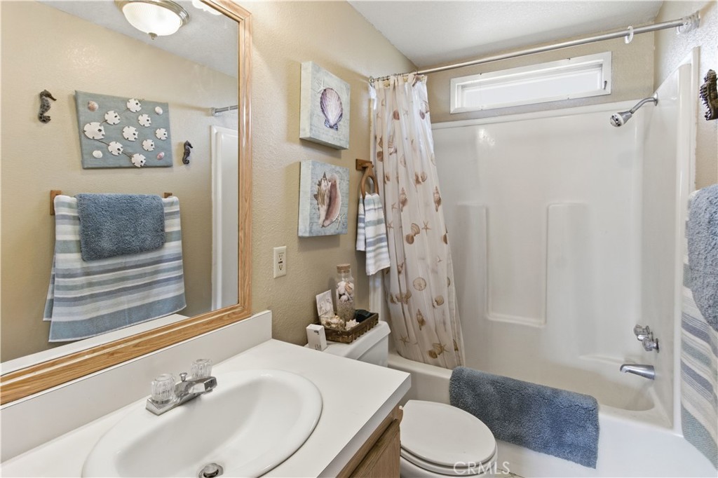 7156 North Winton Way Winton, CA 95388 - Photo 12 of 27 a bathroom with a sink toilet and shower