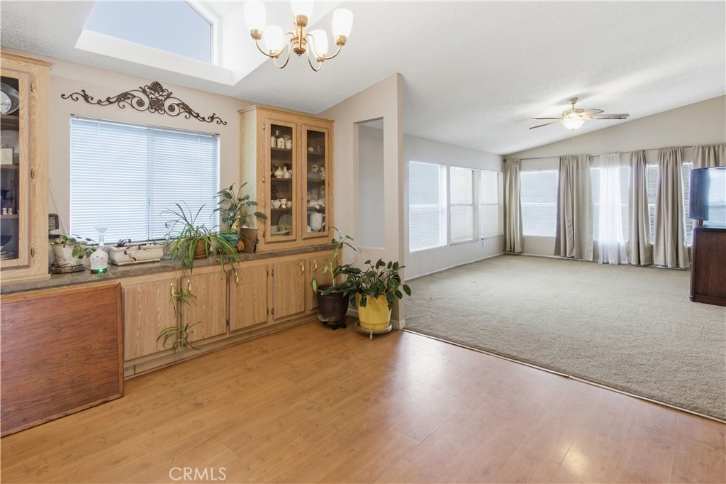 7156 North Winton Way Winton, CA 95388 - Photo 2 of 27 a living room with furniture and chandelier