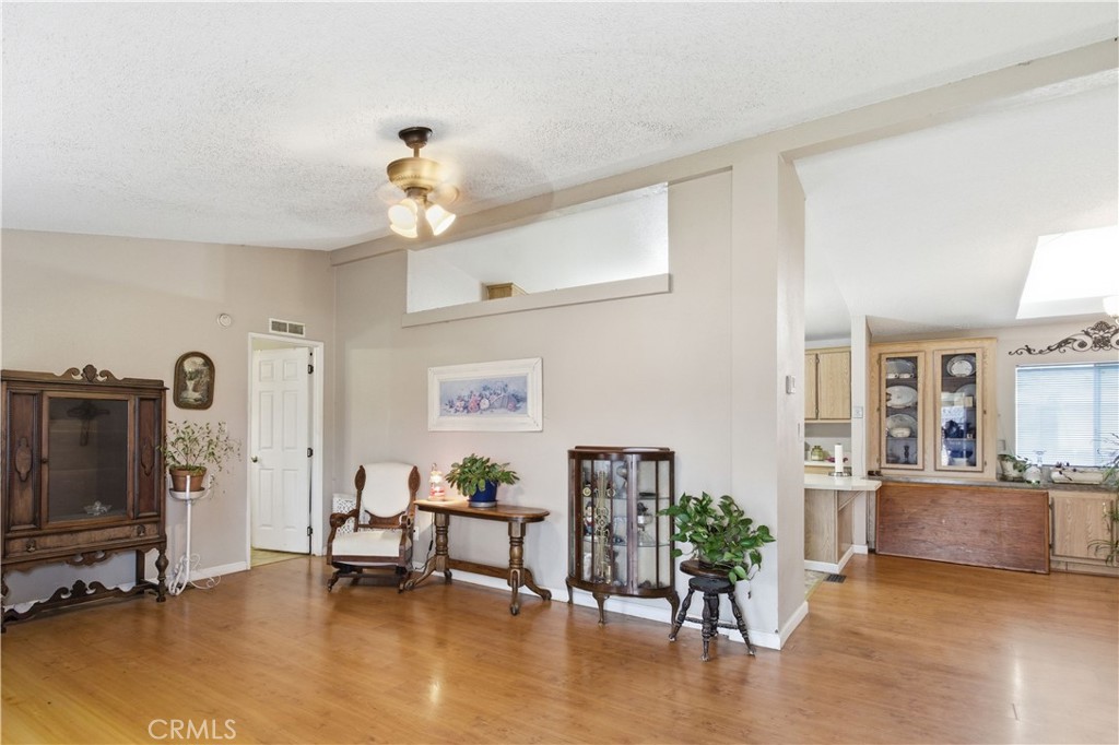 7156 North Winton Way Winton, CA 95388 - Photo 6 of 27 a living room with furniture and a flat screen tv
