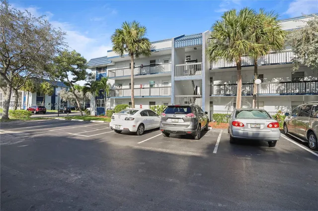 a view of street with parked cars