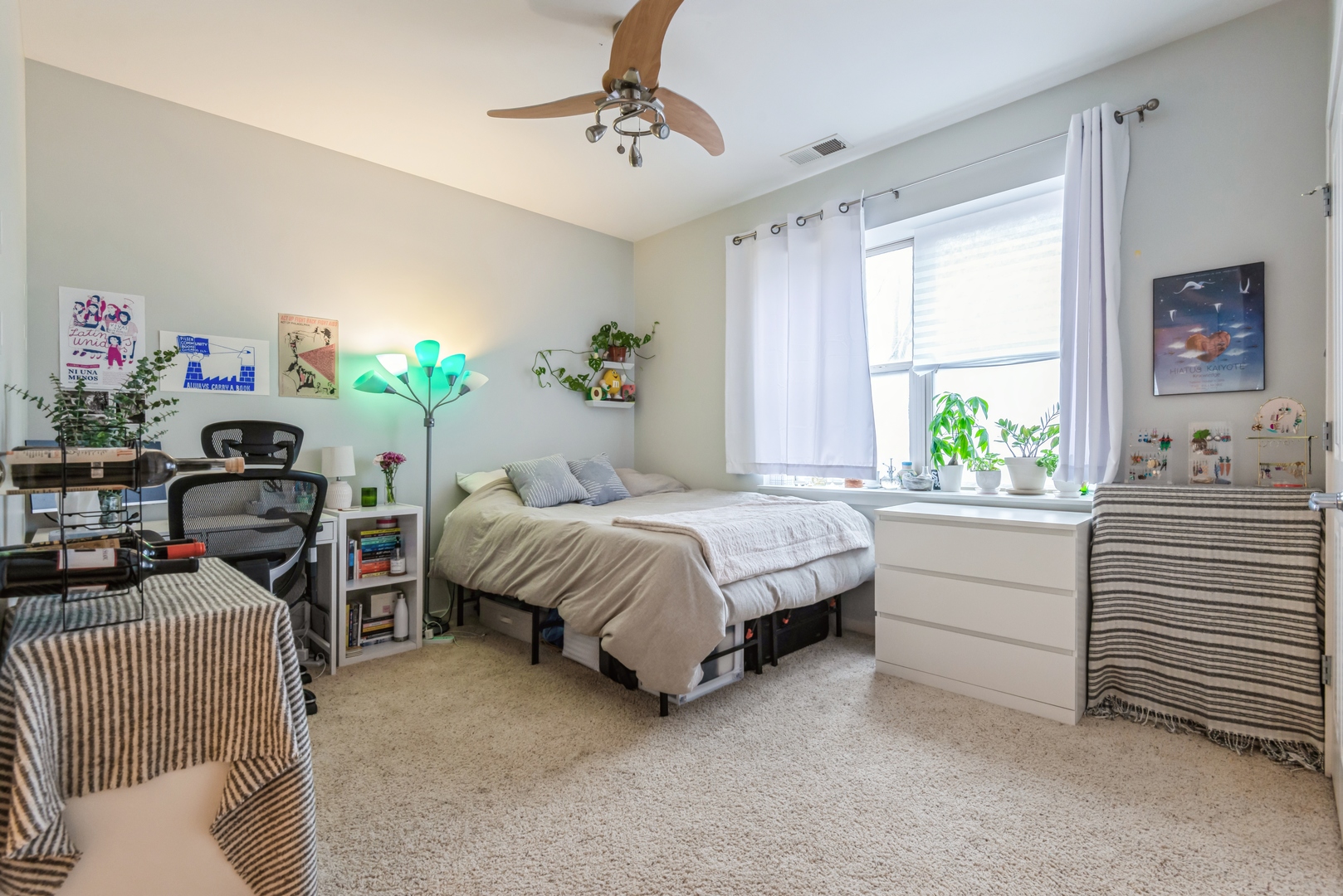 1022 South Racine Avenue, Unit 201 Chicago, IL 60607 - Photo 7 of 13 a bedroom with a bed and a window