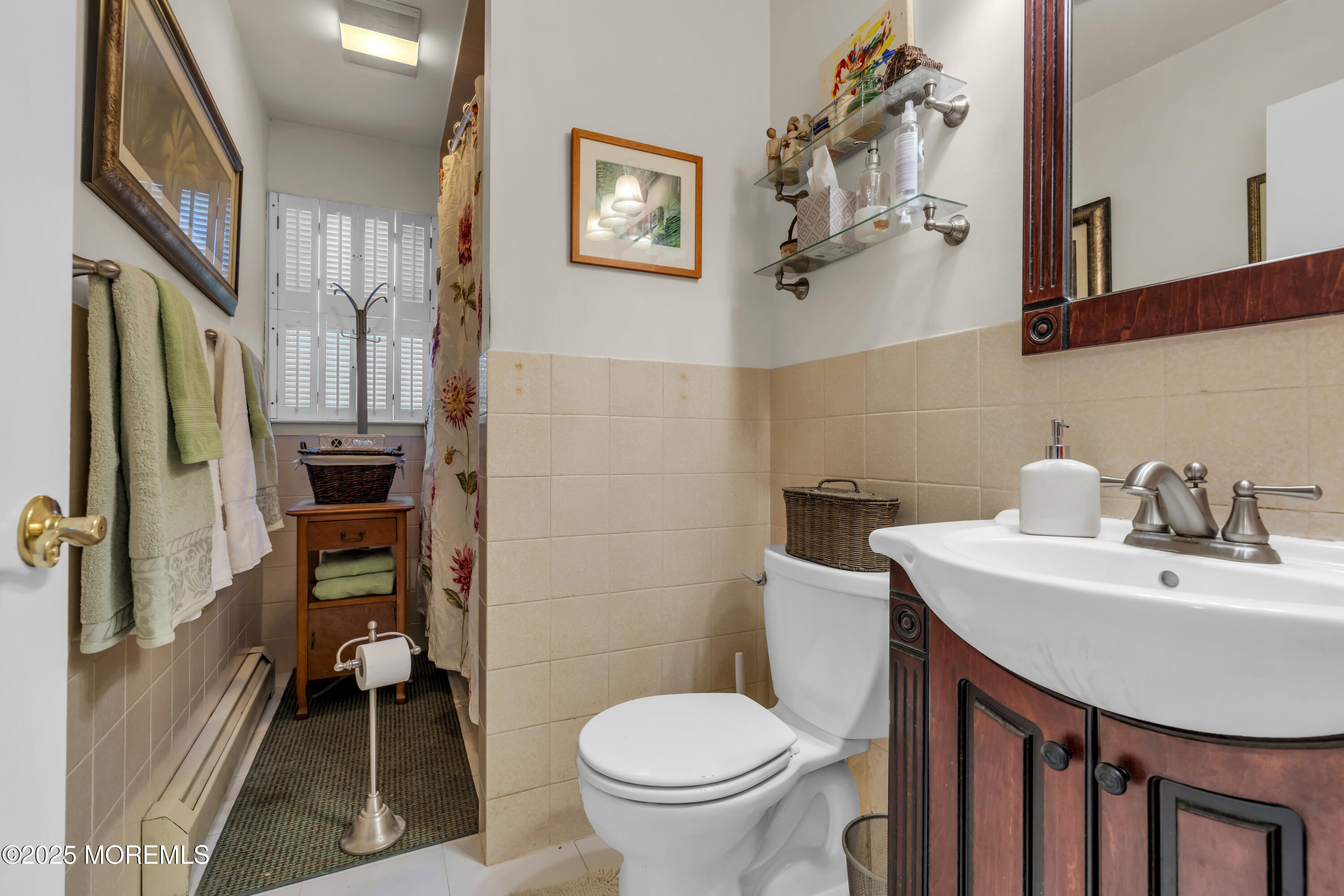 510 Cedar Swamp Road Jackson, NJ 08527 - Photo 18 of 27 a bathroom with a sink a toilet and a mirror