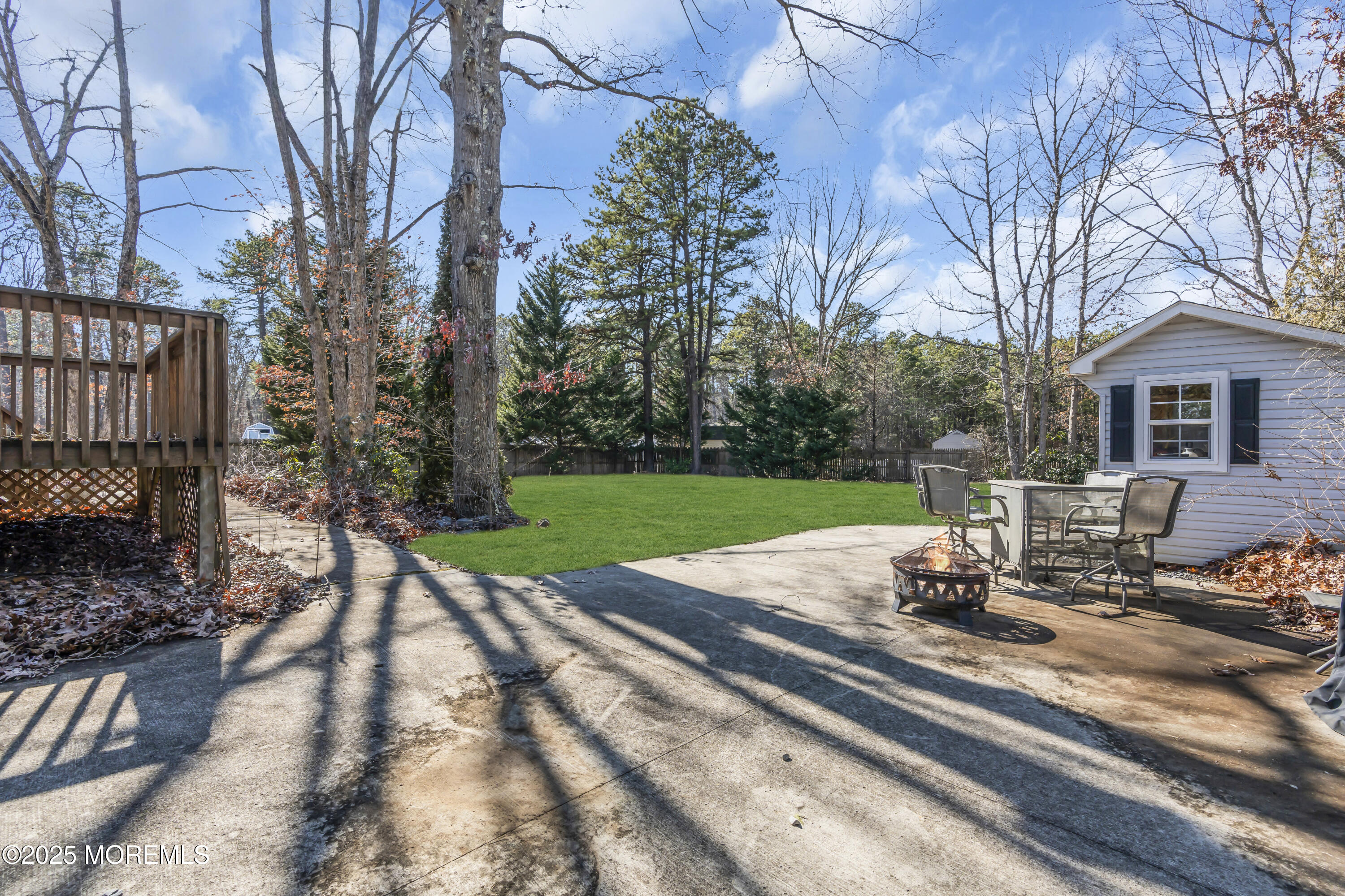 510 Cedar Swamp Road Jackson, NJ 08527 - Photo 23 of 27 a view of a house with backyard and sitting area