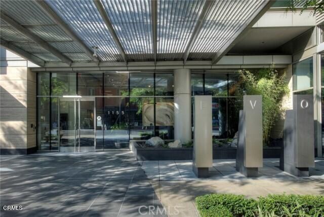 a view of a living room with a large window