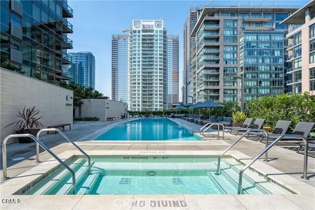 a kitchen with stainless steel appliances a stove and a refrigerator