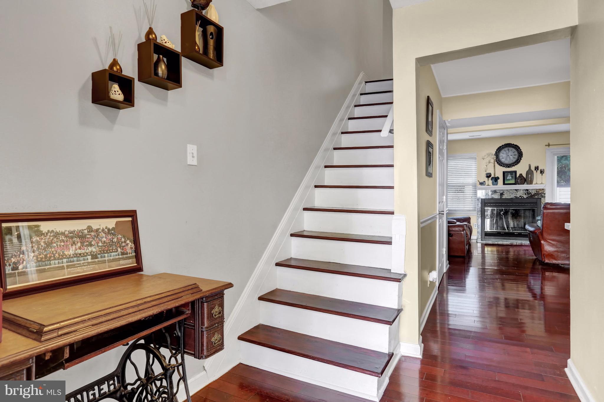 17420 Hoskinson Road Poolesville, MD 20837 - Photo 4 of 28 a view of entryway and hall with wooden floor
