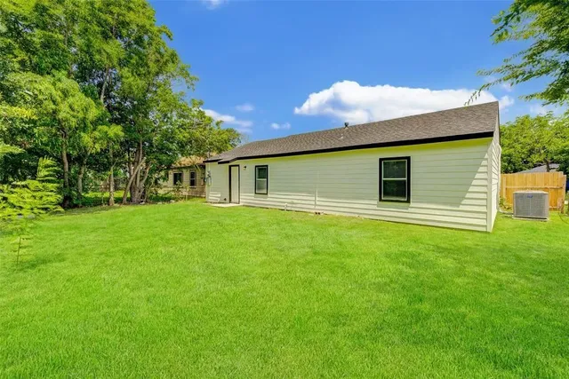 a front view of house with yard