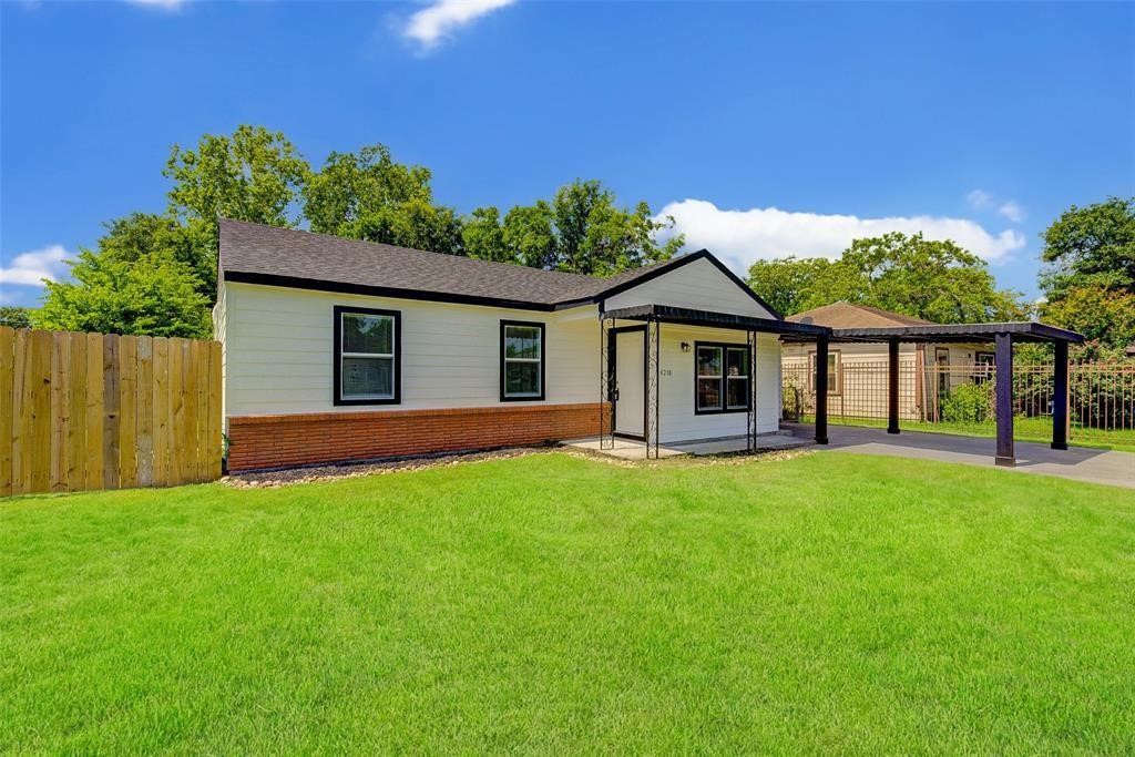 4218 Friar Point Road Houston, TX 77047 - Photo 26 of 26 a view of a house with a yard and porch
