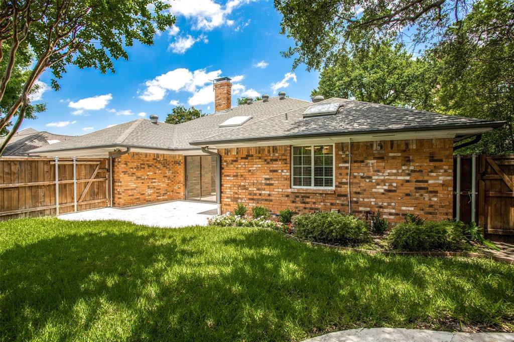 6926 Northwood Road Dallas, TX 75225 - Photo 29 of 29 a front view of a house with a yard