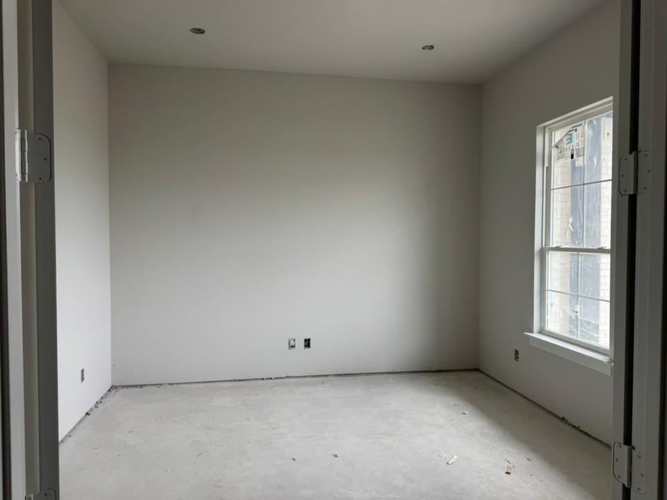 2305 Quartz Street Krum, TX 76249 - Photo 5 of 18 a view of an empty room with a window