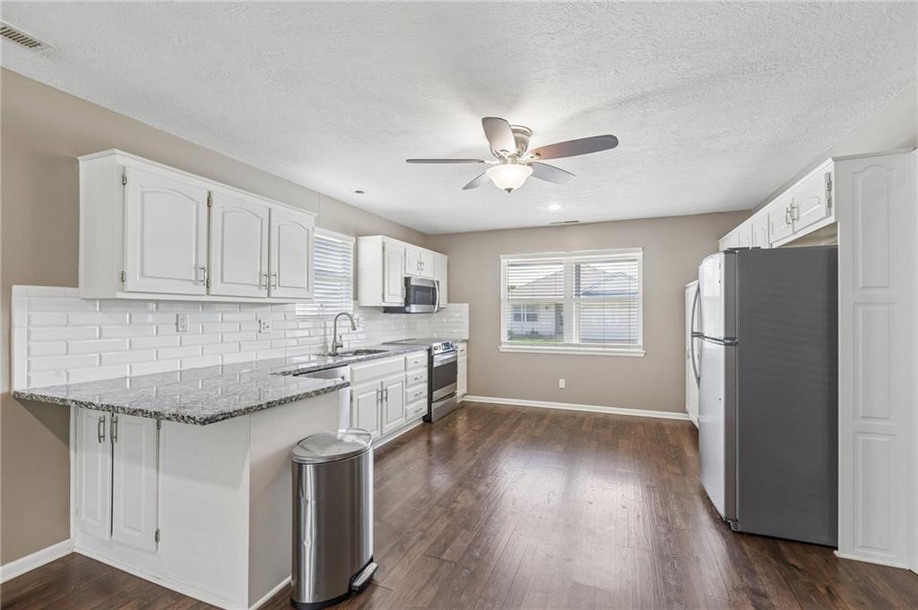 524 Saturn Drive Raymore, MO 64083 - Photo 10 of 31