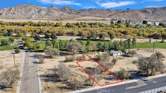 a view of a road with a sign board