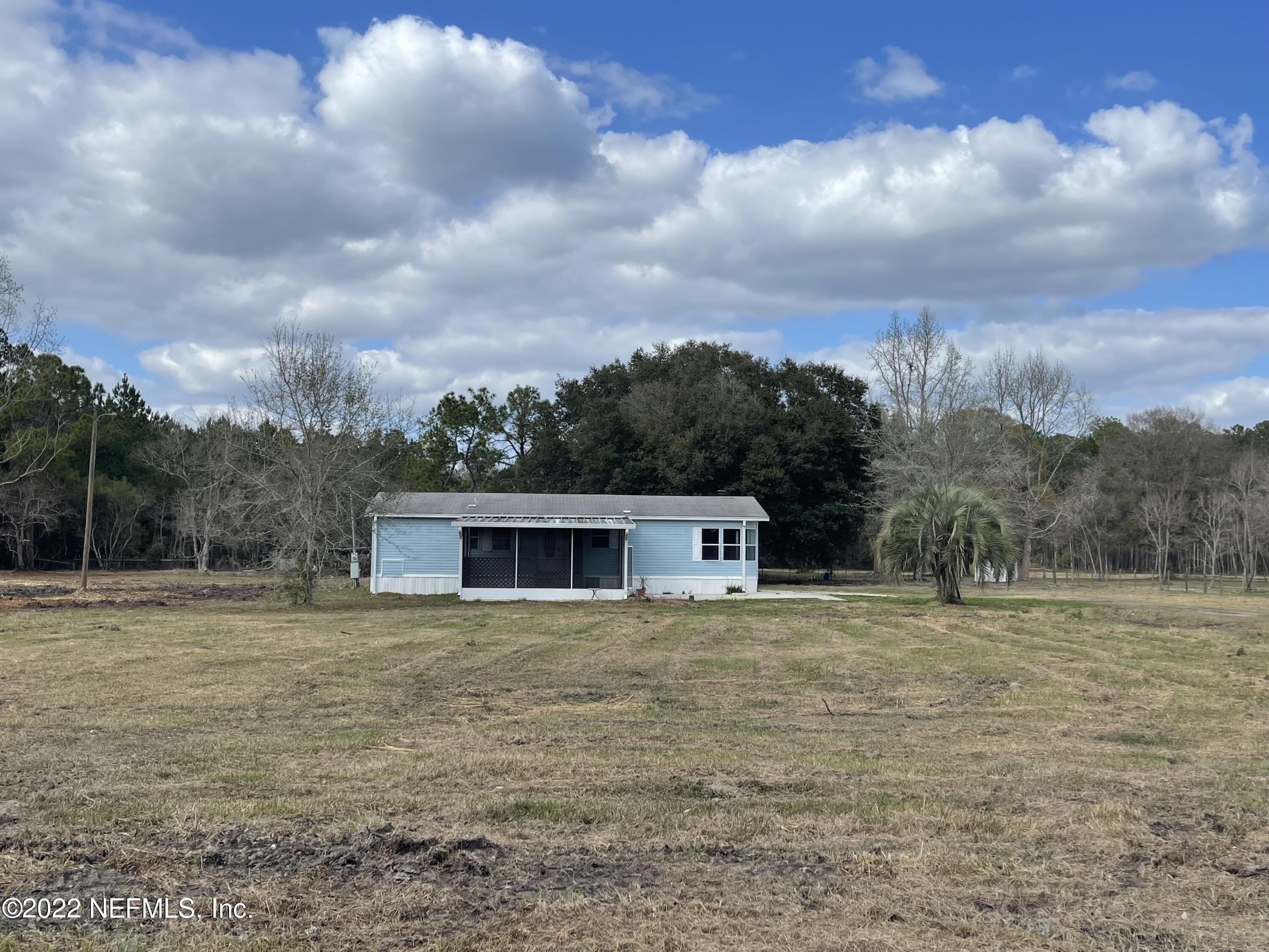 45657 Bismark Road Callahan, FL 32011 - Photo 1 of 21 a view of a with large trees