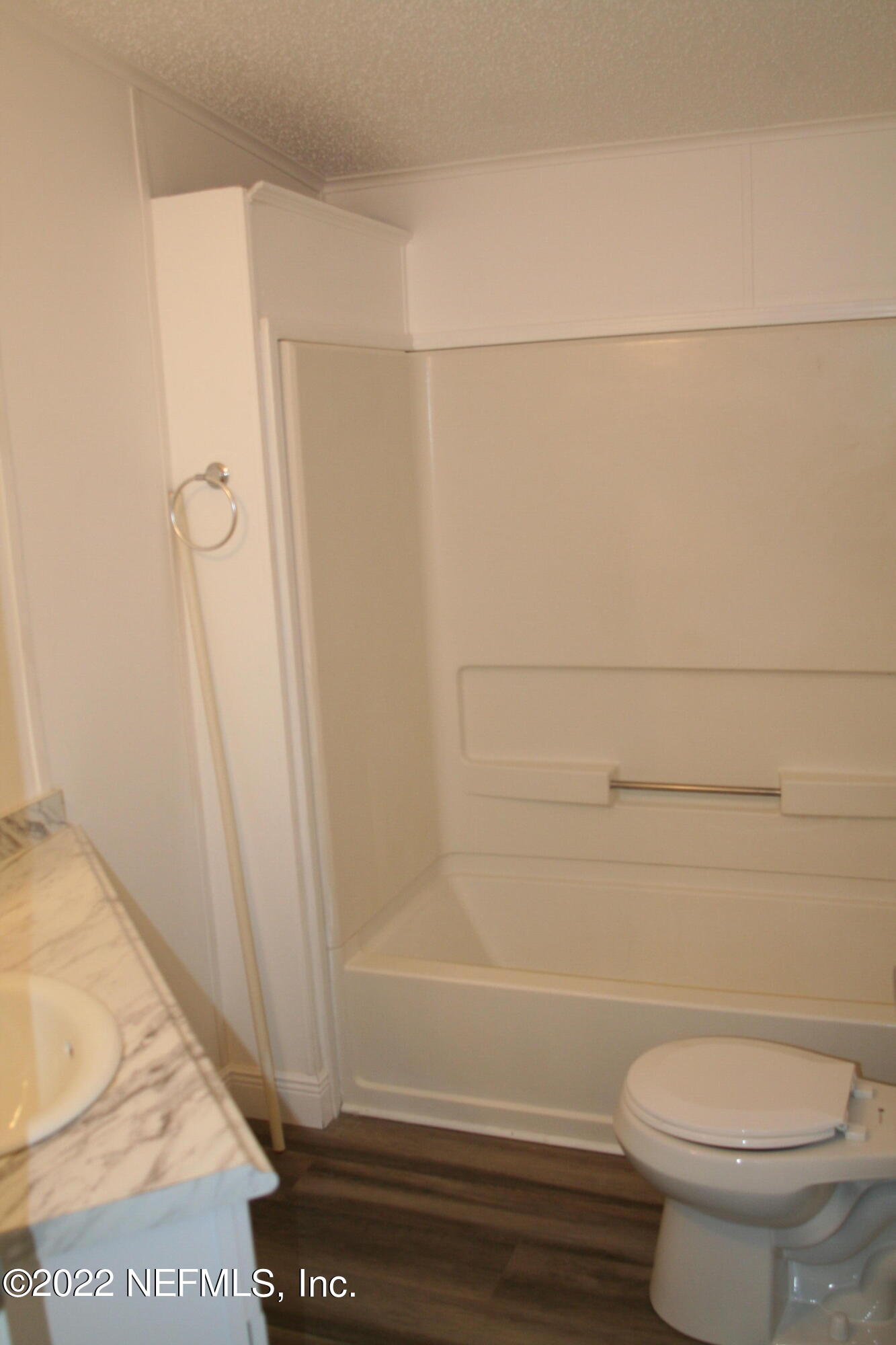 45657 Bismark Road Callahan, FL 32011 - Photo 19 of 21 a bathroom with a toilet and a shower
