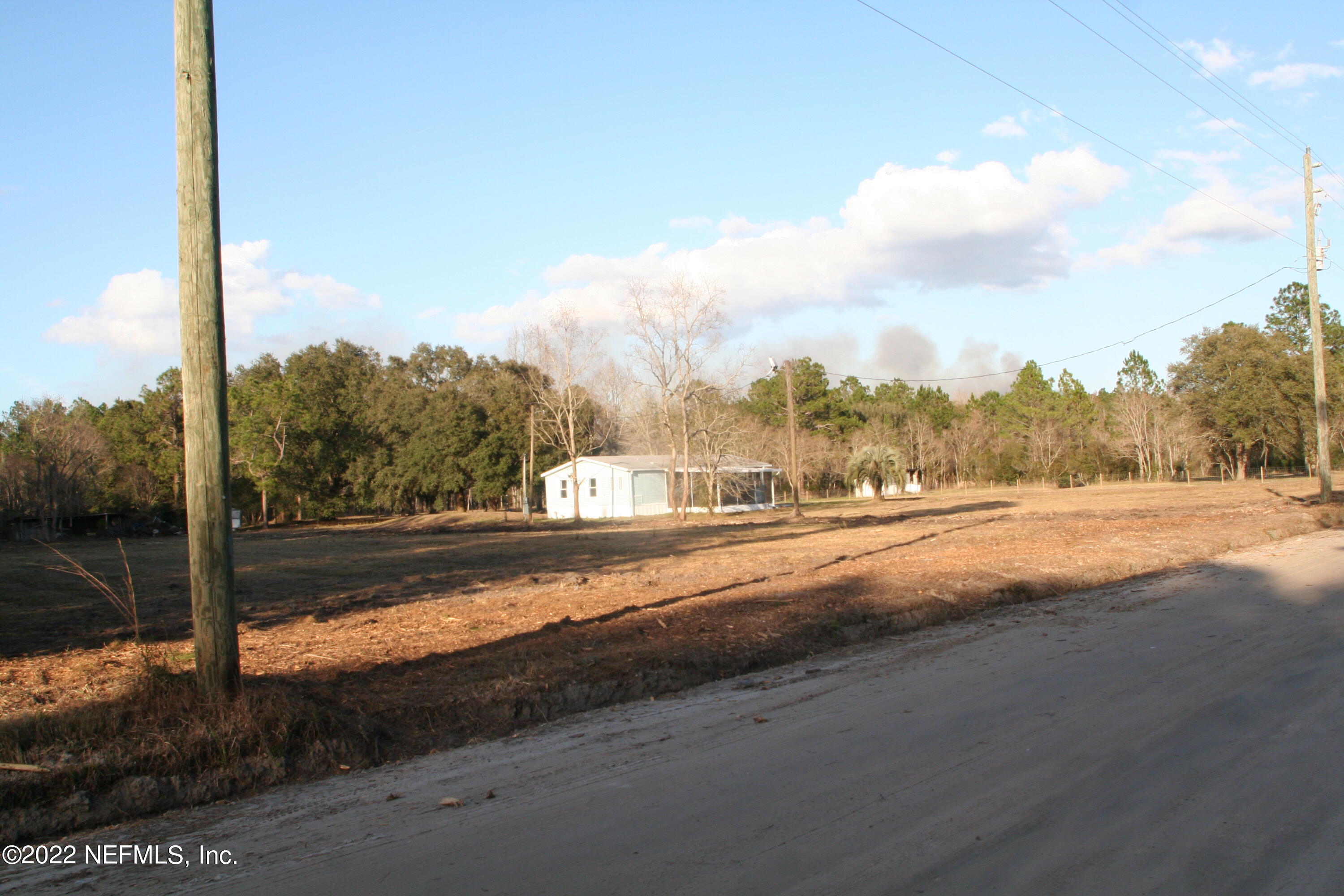 45657 Bismark Road Callahan, FL 32011 - Photo 3 of 21 a view of a city street