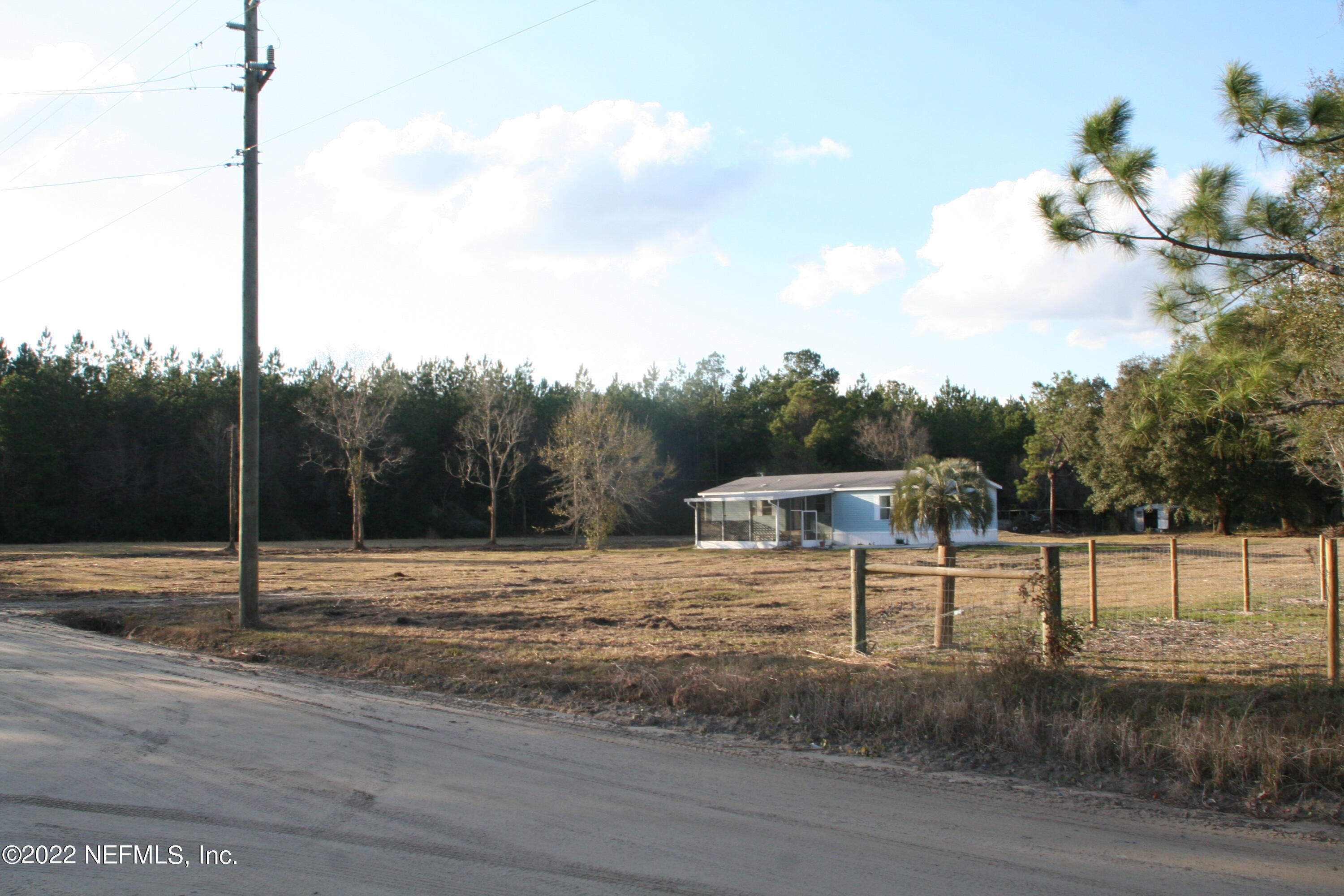 45657 Bismark Road Callahan, FL 32011 - Photo 4 of 21 a view of a backyard