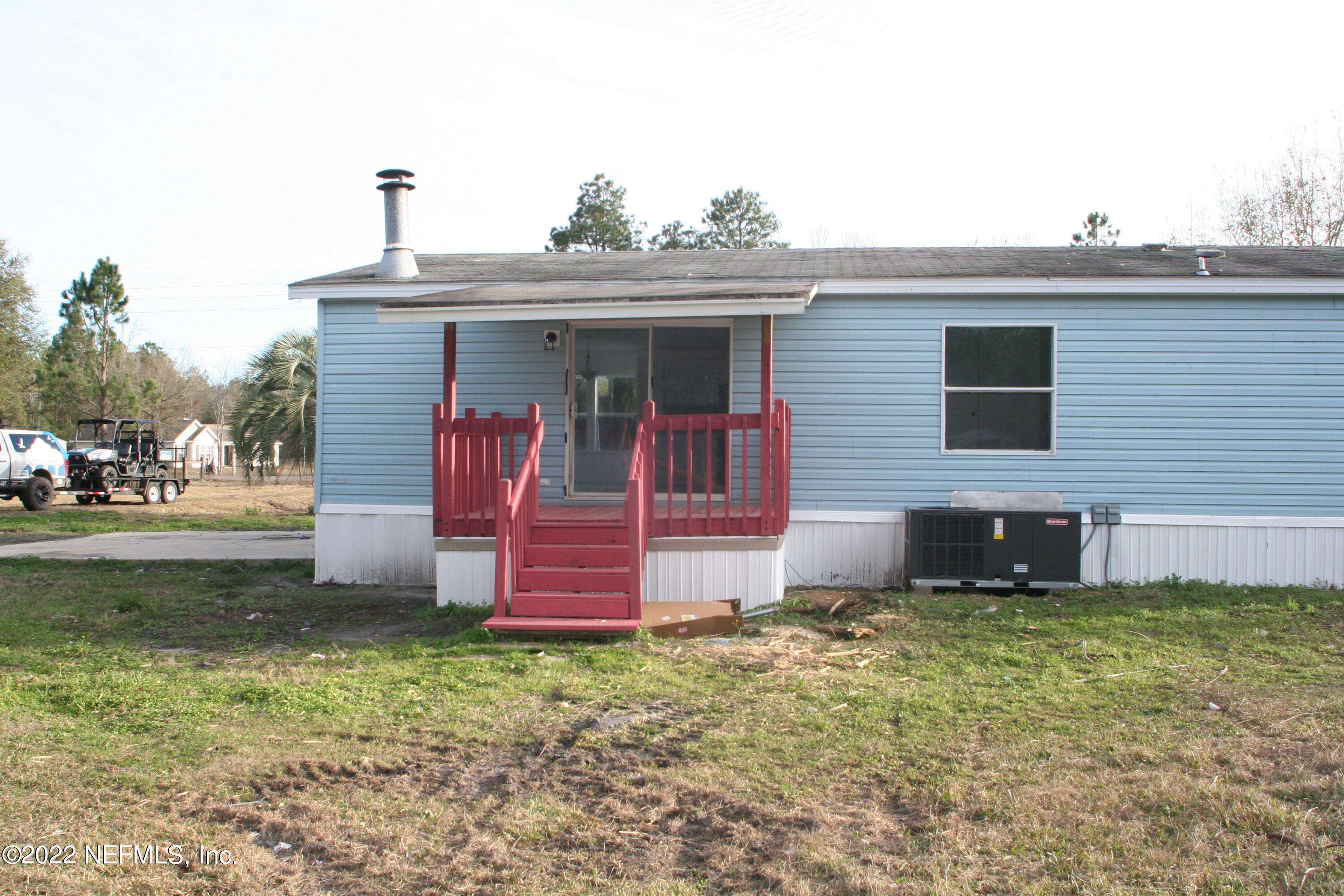 45657 Bismark Road Callahan, FL 32011 - Photo 5 of 21 a view of a house with a yard