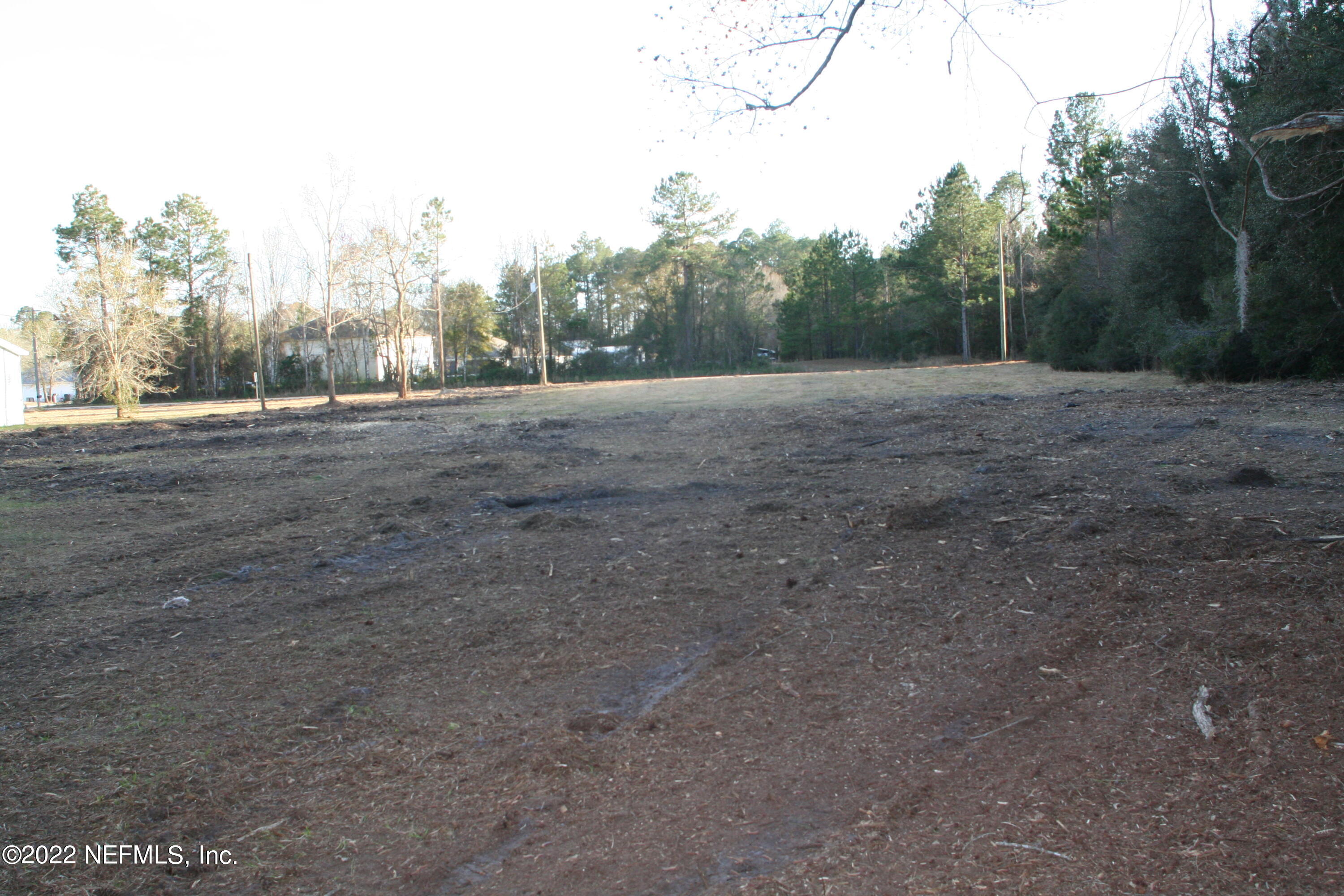 45657 Bismark Road Callahan, FL 32011 - Photo 9 of 21 a view of a outdoor space with trees