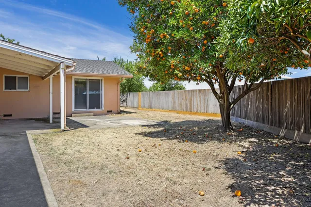 a view of a house with a patio