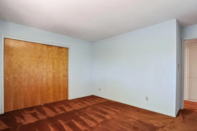 a bathroom with a bathtub and toilet
