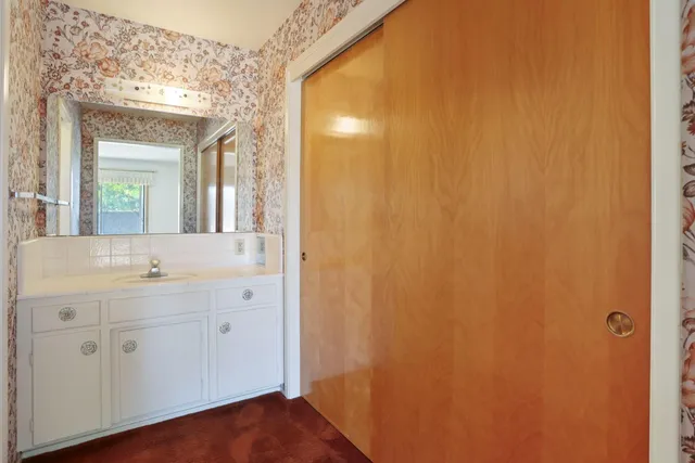 a bathroom with a shower curtain