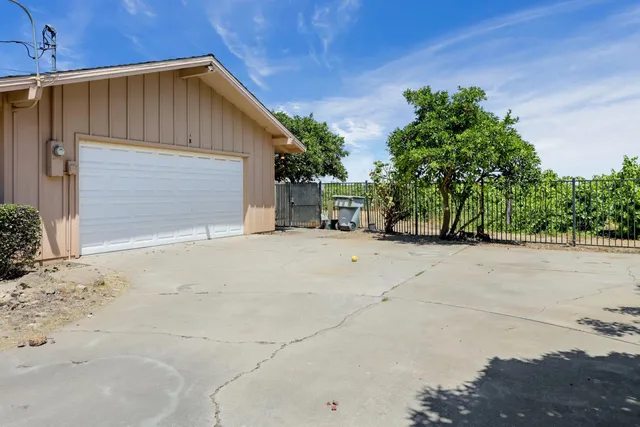 a house with trees in front of it