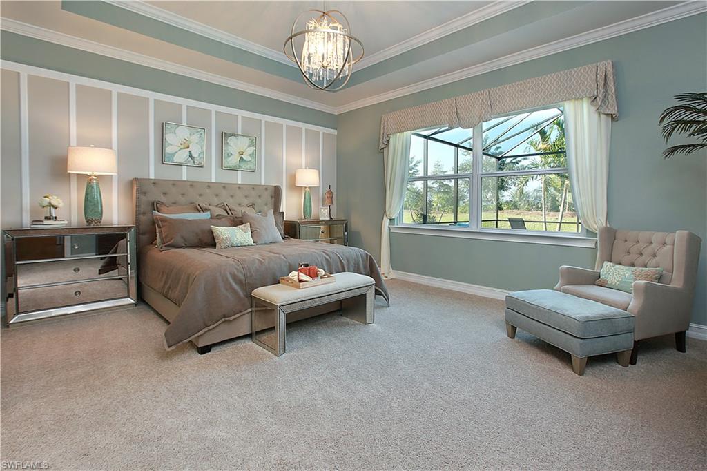 14731 Nautilus Place Naples, FL 34114 - Photo 21 of 22 a living room with furniture and a large window