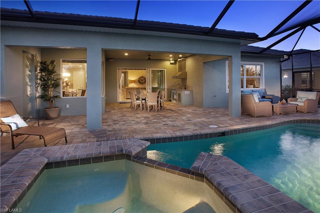 14731 Nautilus Place Naples, FL 34114 - Photo 22 of 22 a view of a house with swimming pool