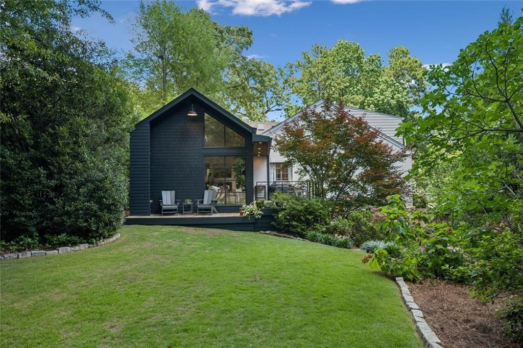 2069 Edinburgh Terrace Northeast Atlanta, GA 30307 - Photo 2 of 72 a view of a house with a yard and a tree