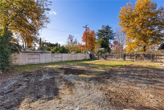 a view of yard with swimming pool
