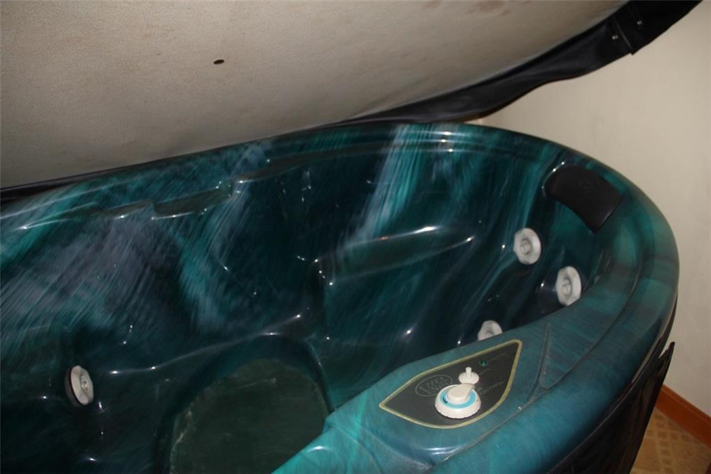 103 School Road Wales, ME 04280 - Photo 28 of 35 Hot tub in the bathroom stays with...