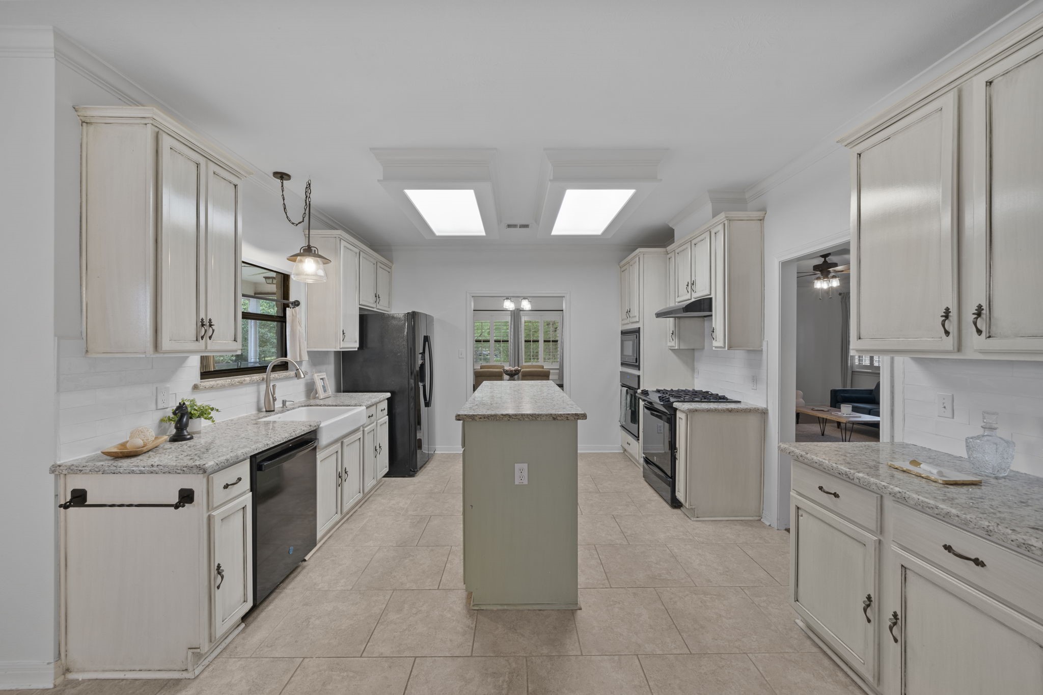 26435 Clay Road Katy, TX 77493 - Photo 12 of 50 a large kitchen with a large counter top appliances and cabinets