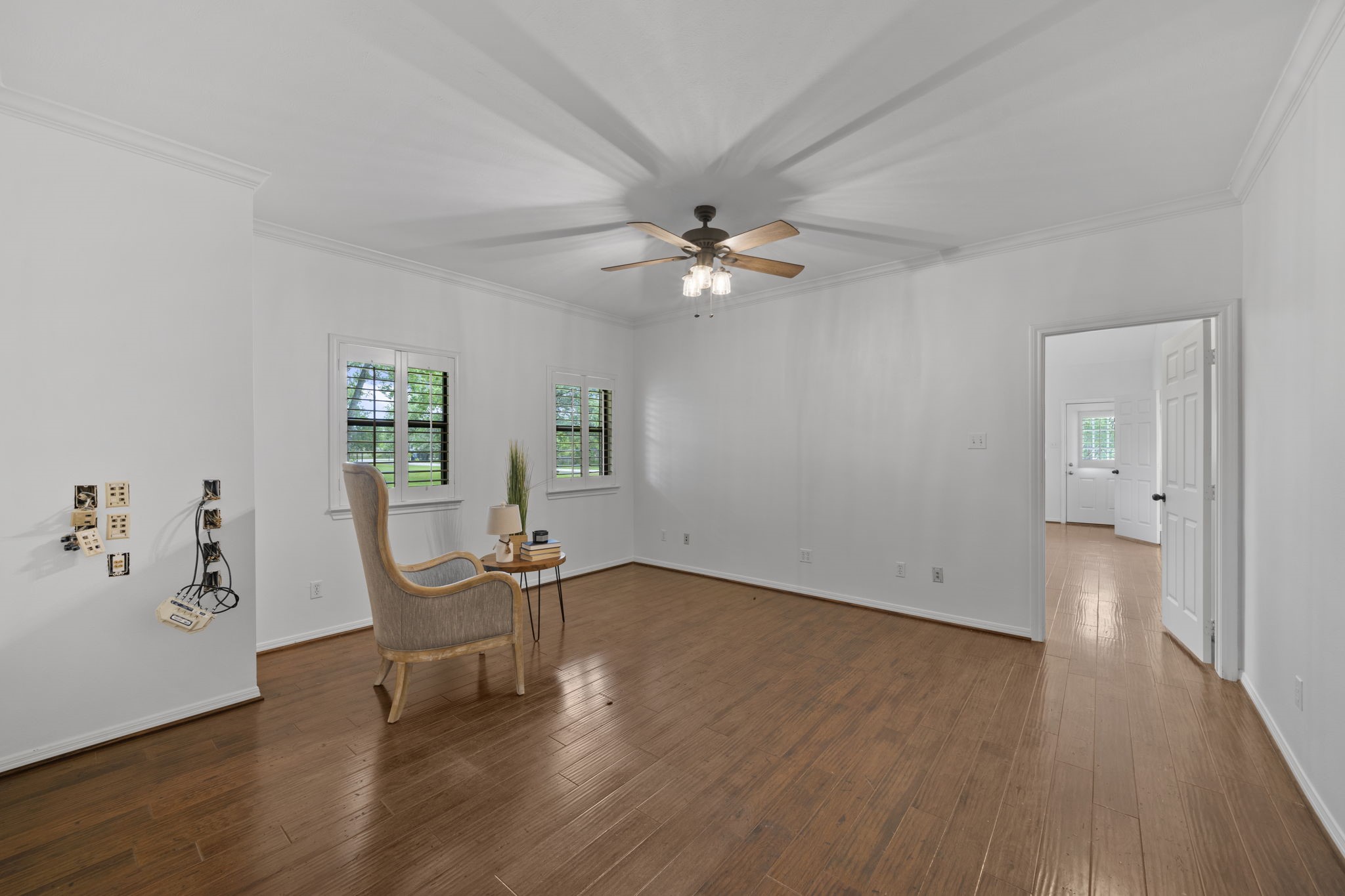 26435 Clay Road Katy, TX 77493 - Photo 16 of 50 an empty room with wooden floor and windows