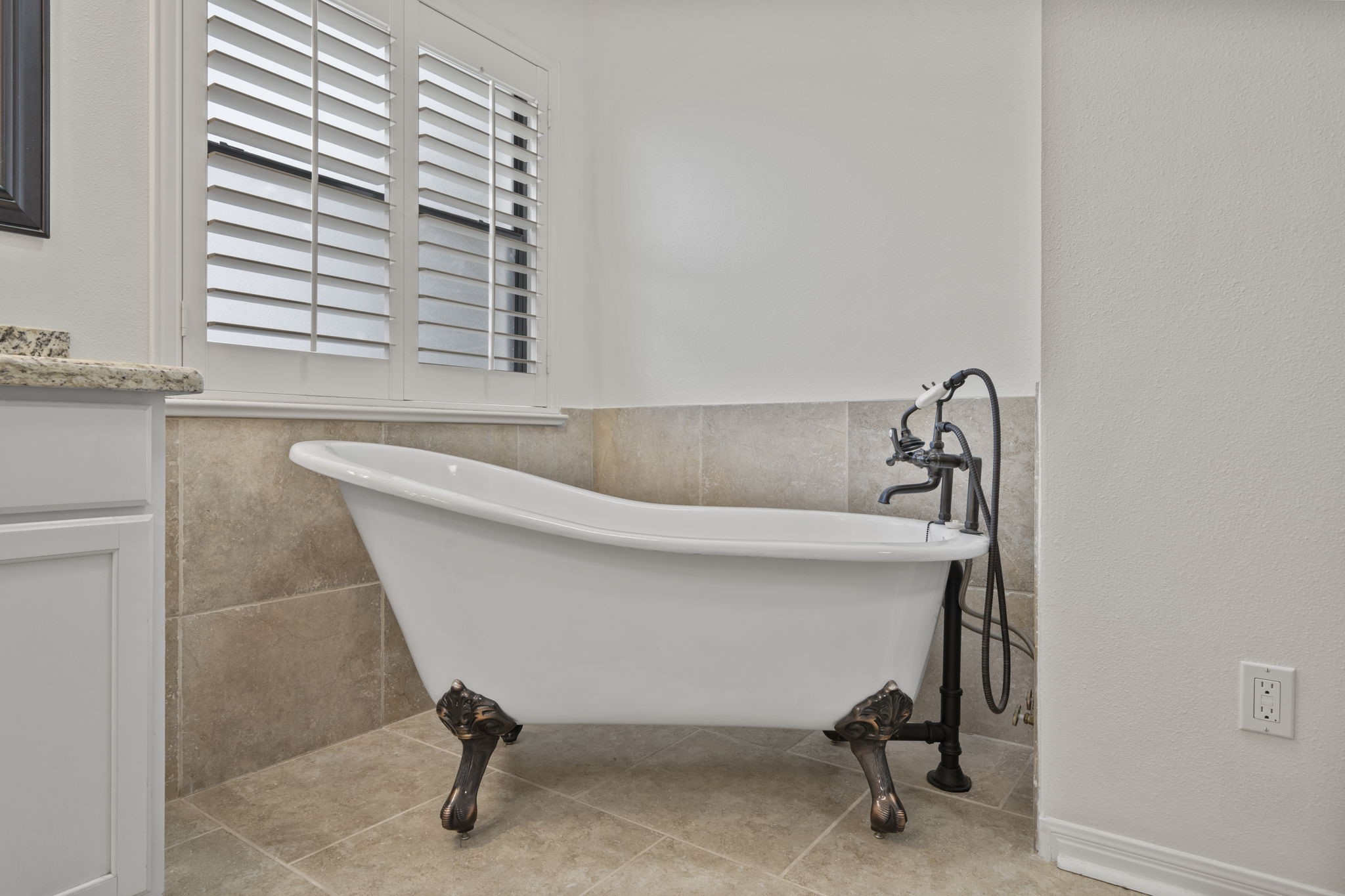 26435 Clay Road Katy, TX 77493 - Photo 22 of 50 a white bath tub sitting in a bathroom