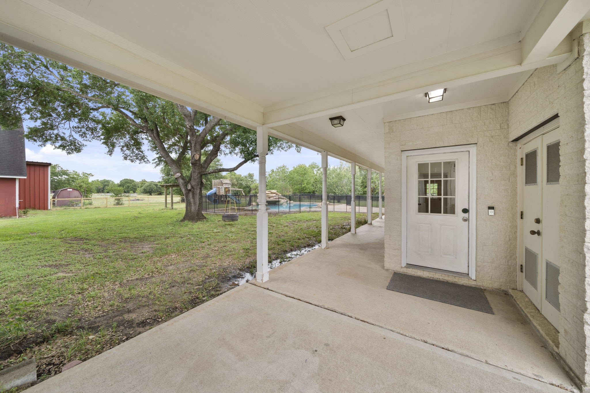 26435 Clay Road Katy, TX 77493 - Photo 34 of 50 a view of a house with backyard and a garden