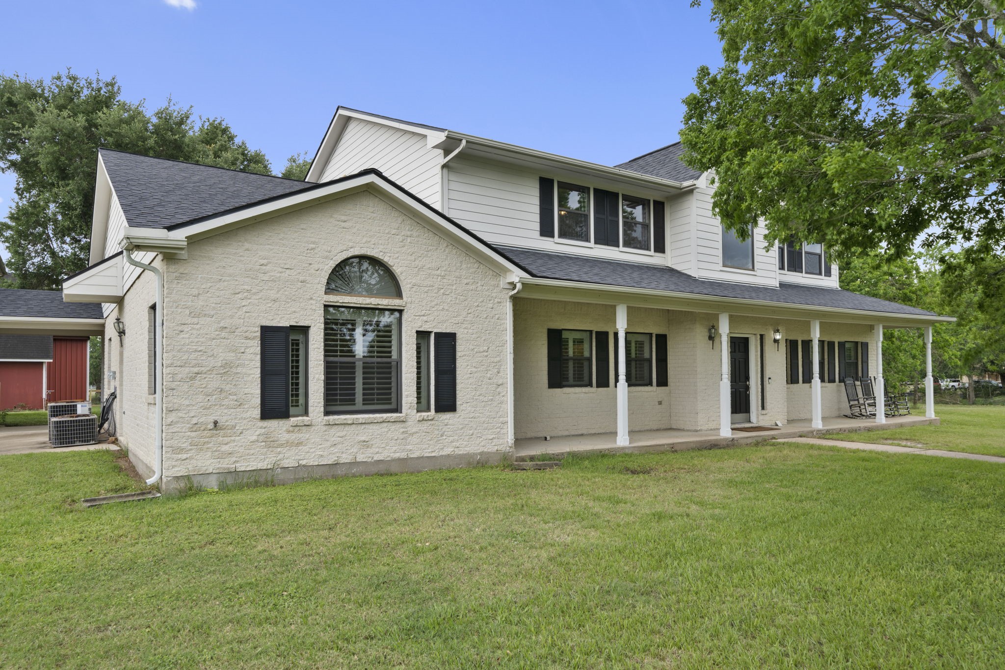 26435 Clay Road Katy, TX 77493 - Photo 37 of 50 a front view of a house with a garden