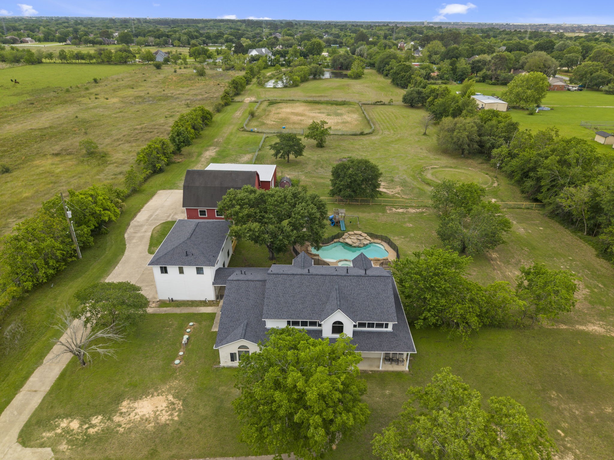 26435 Clay Road Katy, TX 77493 - Photo 44 of 50 an aerial view of residential houses with outdoor space and river