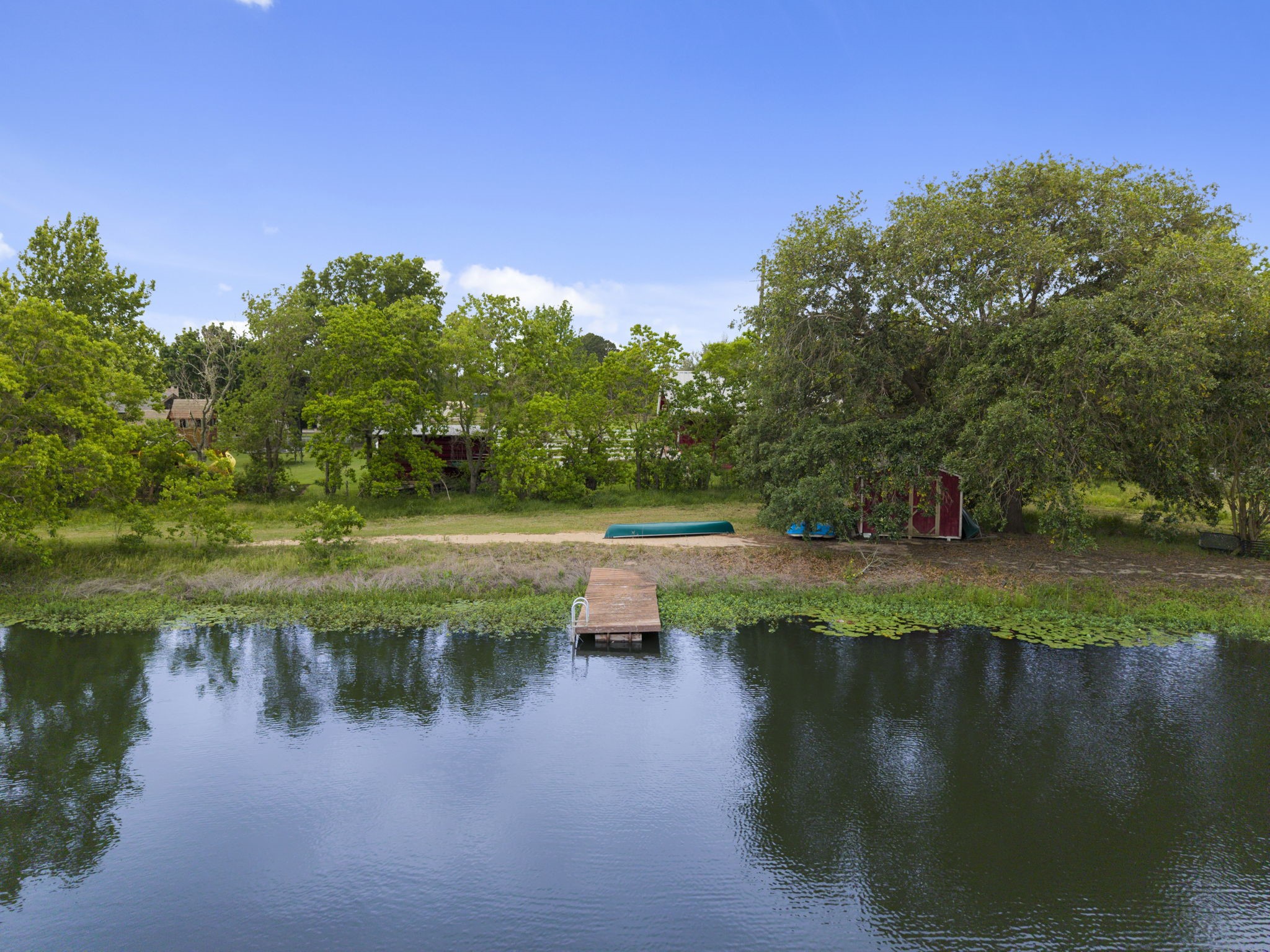 26435 Clay Road Katy, TX 77493 - Photo 46 of 50 a view of a lake view with a garden