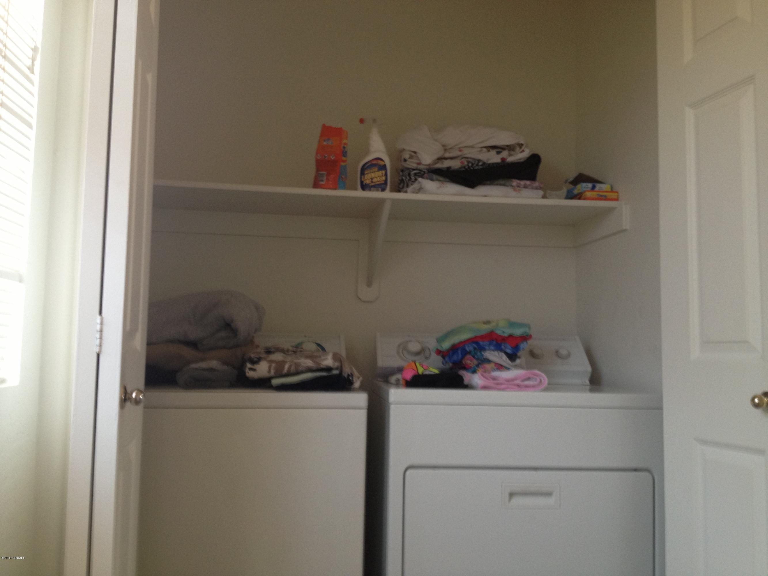 11805 North Olive Street El Mirage, AZ 85335 - Photo 4 of 21 Inside laundry with W/D
