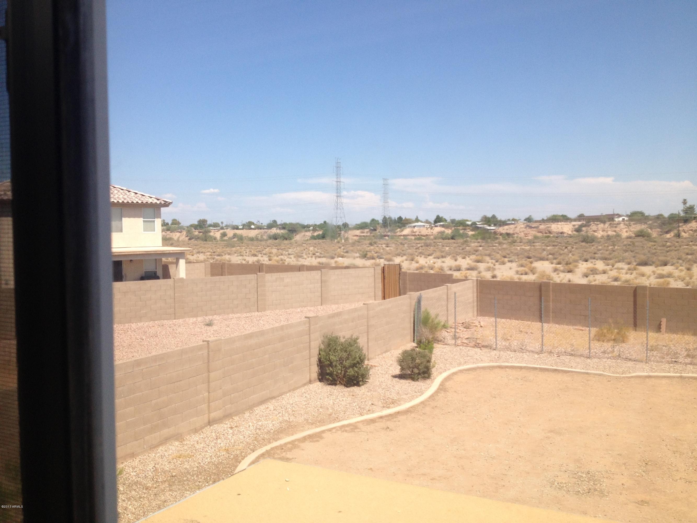 11805 North Olive Street El Mirage, AZ 85335 - Photo 8 of 21 Dog run at the back of large lot
