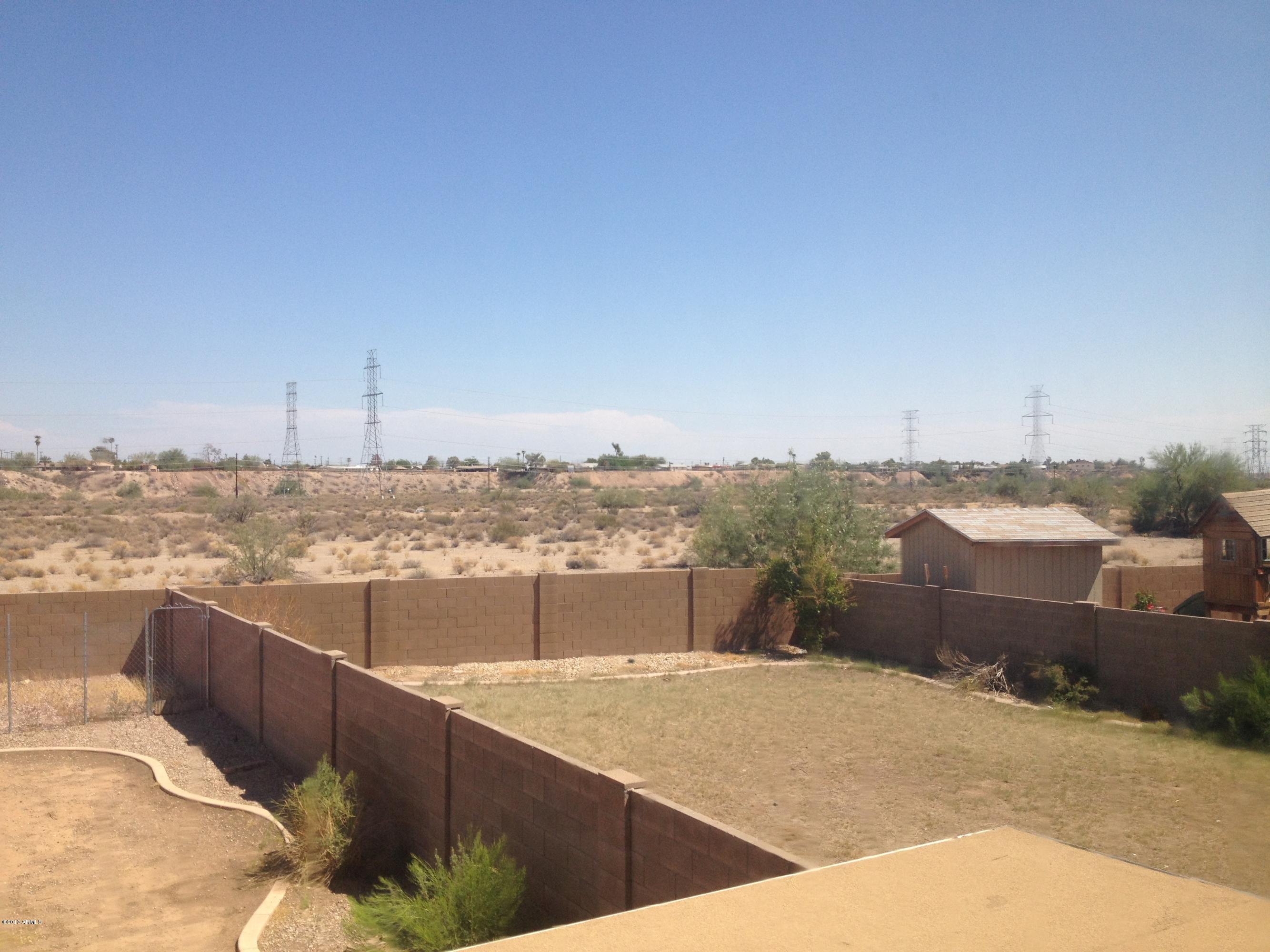 11805 North Olive Street El Mirage, AZ 85335 - Photo 9 of 21 Huge yards with Block walls