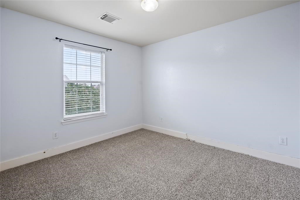 20729 Patriot Park Lane Katy, TX 77449 - Photo 16 of 39 an empty room with a window